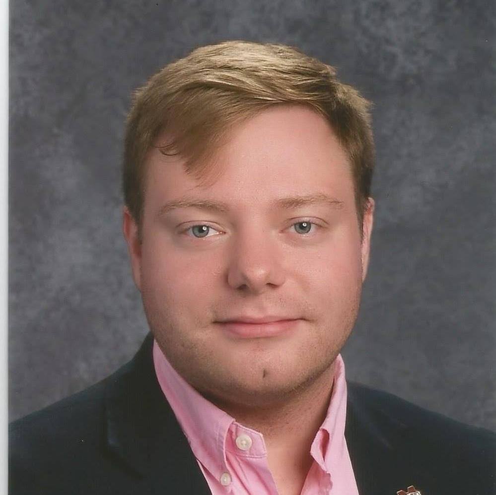Professional headshot of John-Peter S. Ford, Graduate Affiliate